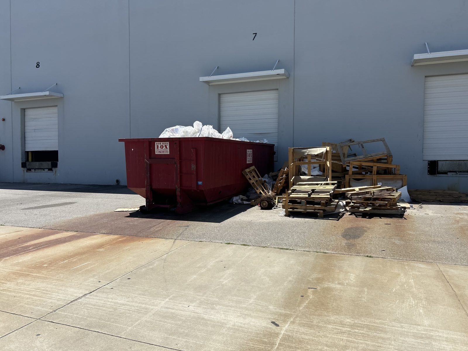 Big Red Box roll-off dumpster on a commercial cleanout job in Cayce, SC