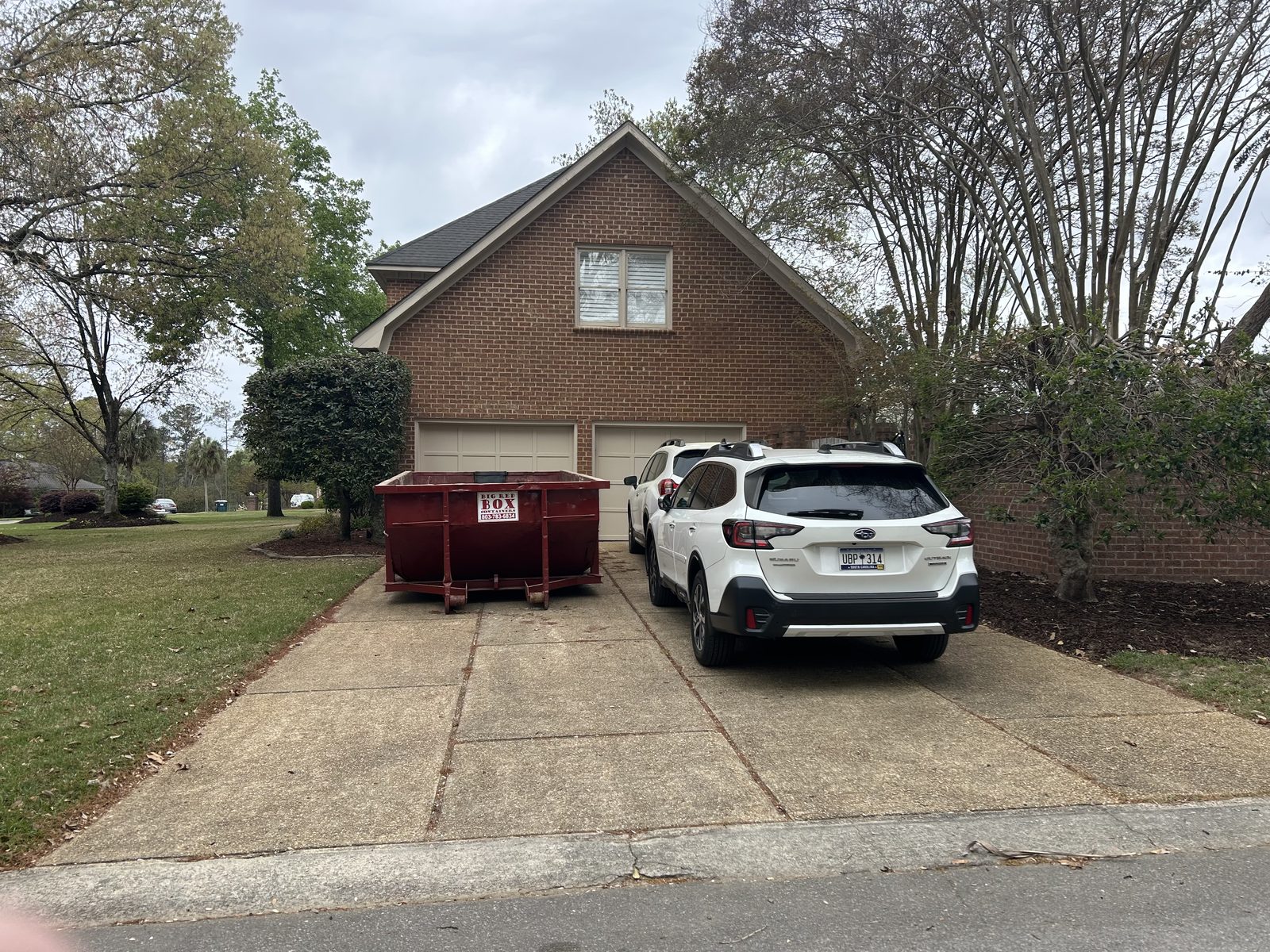 Big Red Box roll-off dumpster on a residential job in Columbia, SC